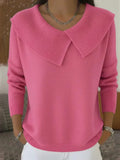 Women's pink ribbed knit sweater with wide collar and long sleeves