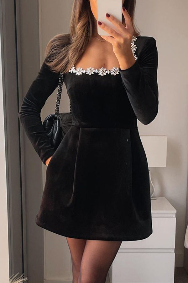 Women's velvet mini dress with embellished square neckline, long sleeves and flared skirt