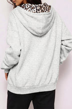 Women's oversized zip hoodie with leopard-lined hood and front pockets