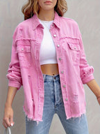 Women's pink distressed denim jacket with pockets and frayed hem
