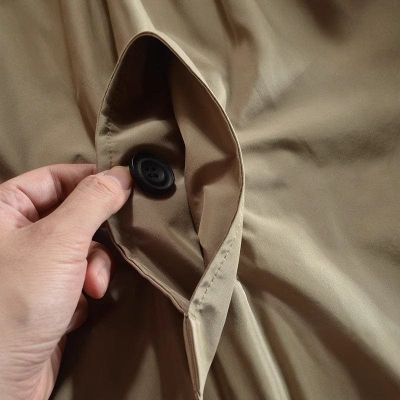 Men's collared waterproof trench coat with button fastening