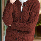 Women's textured cable knit cardigan with crew neck, long sleeves and button front