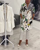 Women's grey long blouse with illustrated character print, stand collar and button front