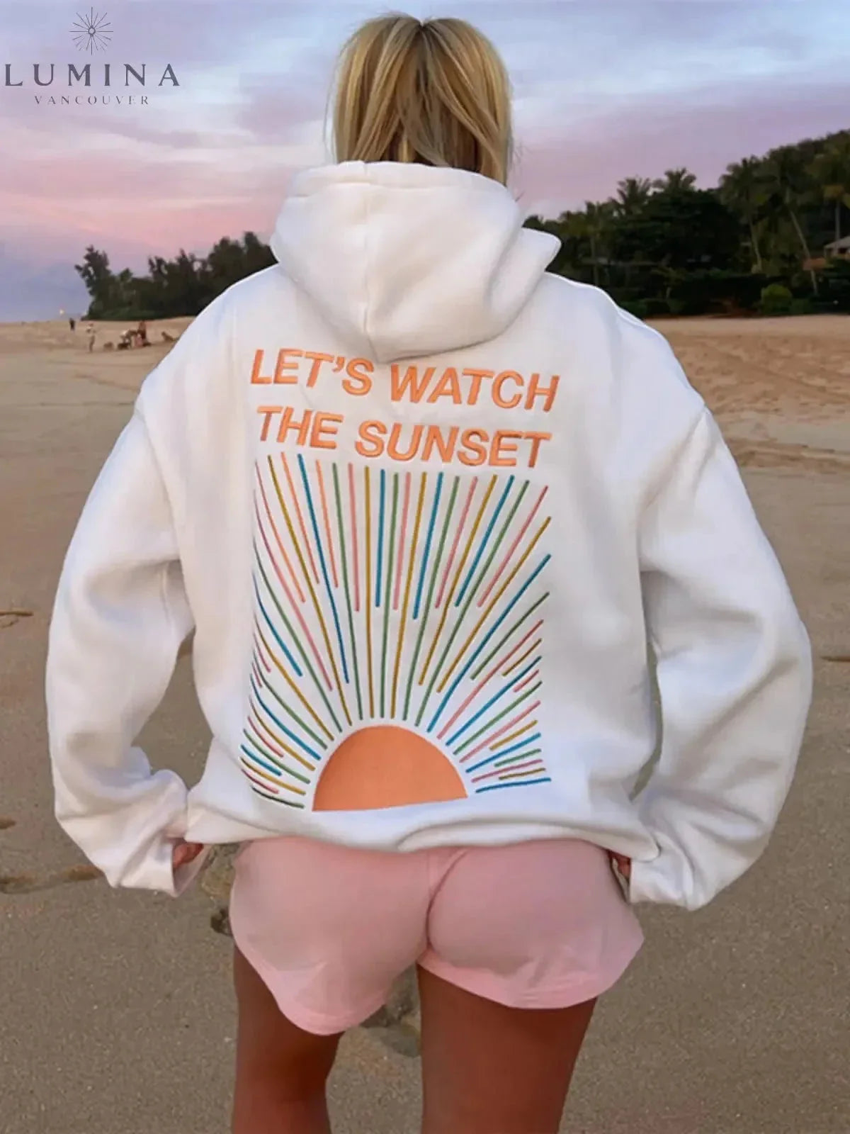 Women's hoodie with sunset graphic on the back