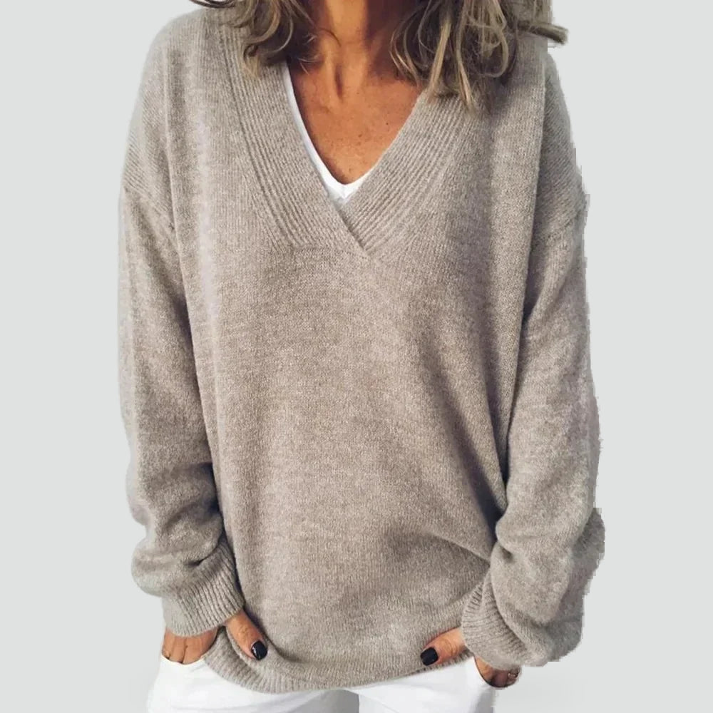 Women's grey relaxed V-neck sweater with long sleeves