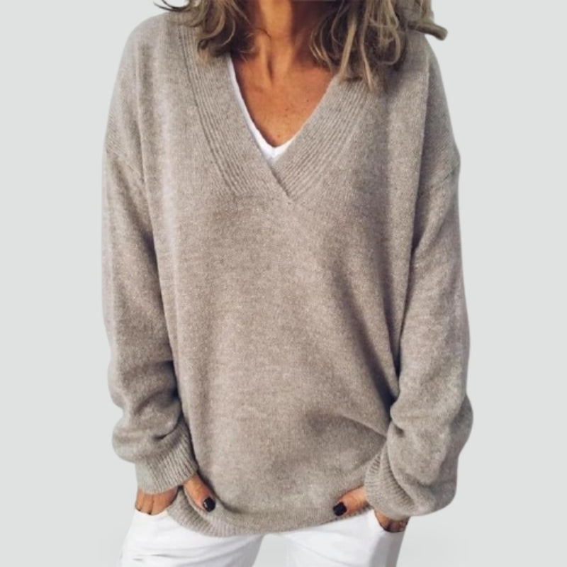 Women's grey relaxed V-neck sweater with long sleeves