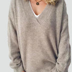 Women's grey relaxed V-neck sweater with long sleeves