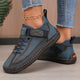 High-top sneakers with lace-up front and stitched panels