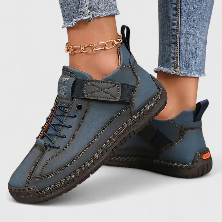 Women's strap sneakers with lace-up fronts and stitched soles