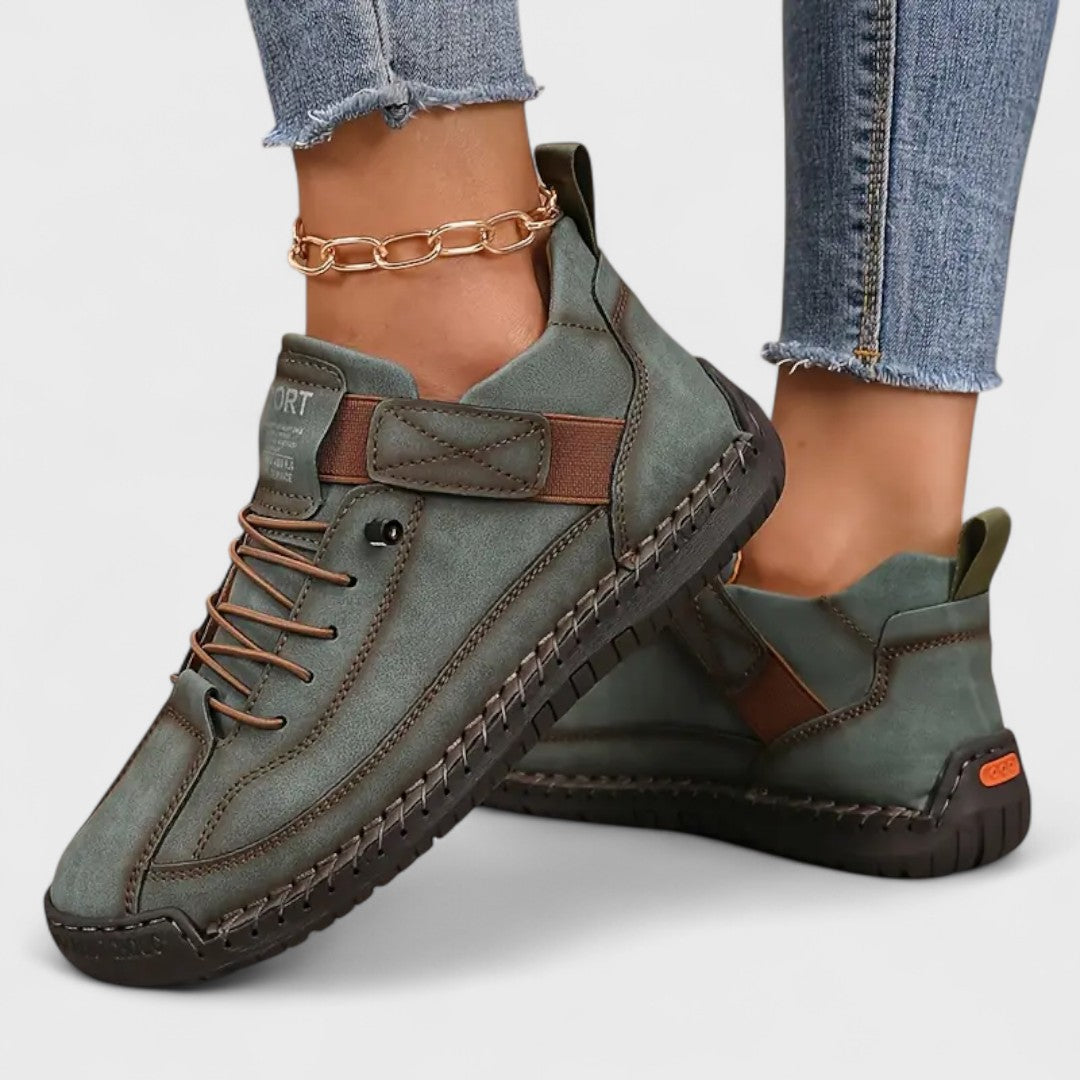 Women's lace-up casual sneakers with ankle strap, stitched panels and textured sole