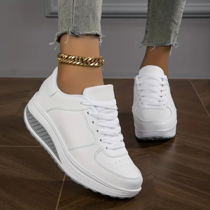 Women's low-top lace-up sneaker with printed symbols, round toe and white sole