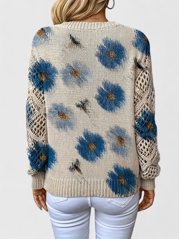 Women's floral V-neck sweater with long sleeves and open-knit sleeve panels