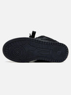 Black high-top skate trainers with textured panels and lace-up fastening