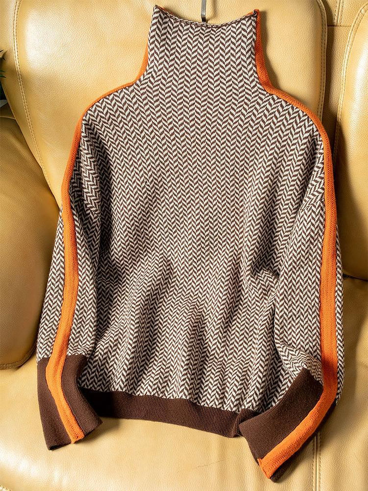Women's geometric turtleneck sweater with contrasting sleeve stripes