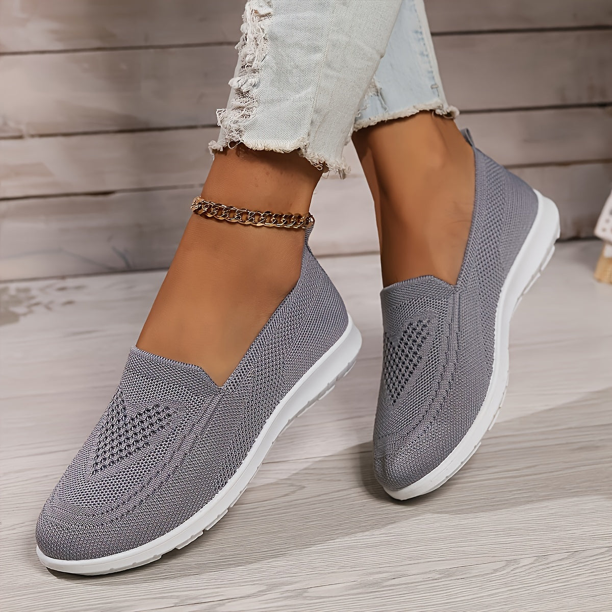 Women's knitted slip-on walking trainer with white flat sole
