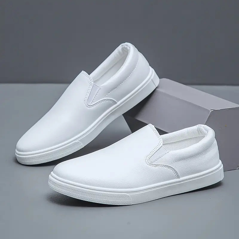 Men's slip-on loafers with rounded toes and contrasting white soles