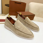 Men's moc toe slip-on loafers with stitched detailing and flat soles