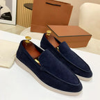 Men's moc toe slip-on loafers with stitched detailing and flat soles
