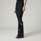 Women's knee-high platform boots with decorative buckle detail