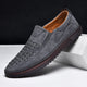 Men's perforated slip-on loafer with round toe and flat textured sole