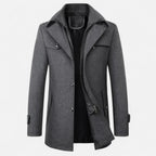 Men's long coat with stand collar, zip and button front, and multiple pockets
