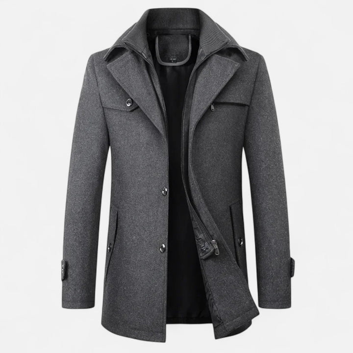 Men's long coat with stand collar, zip and button front, and multiple pockets