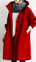Women's hooded button-front trench coat with long sleeves and side pockets