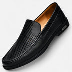 Men's perforated brown moc toe slip-on loafer with low heel
