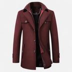 Men's long coat with stand collar, zip and button front, and multiple pockets