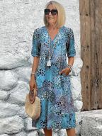 Women's multicoloured floral midi dress with V-neck, short sleeves and pockets