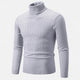 Men's cable knit turtleneck sweater with long sleeves and ribbed trims