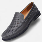 Men's perforated brown moc toe slip-on loafer with low heel