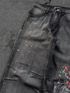 Dark washed wide leg jeans with dragon and floral embroidery