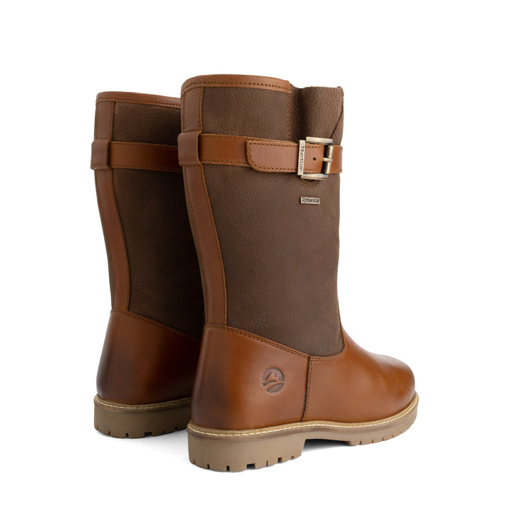 Brown tall boots with buckle straps, rounded toes and low heels