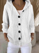 Women's hooded knitted cardigan with long sleeves, buttons and ribbed trims