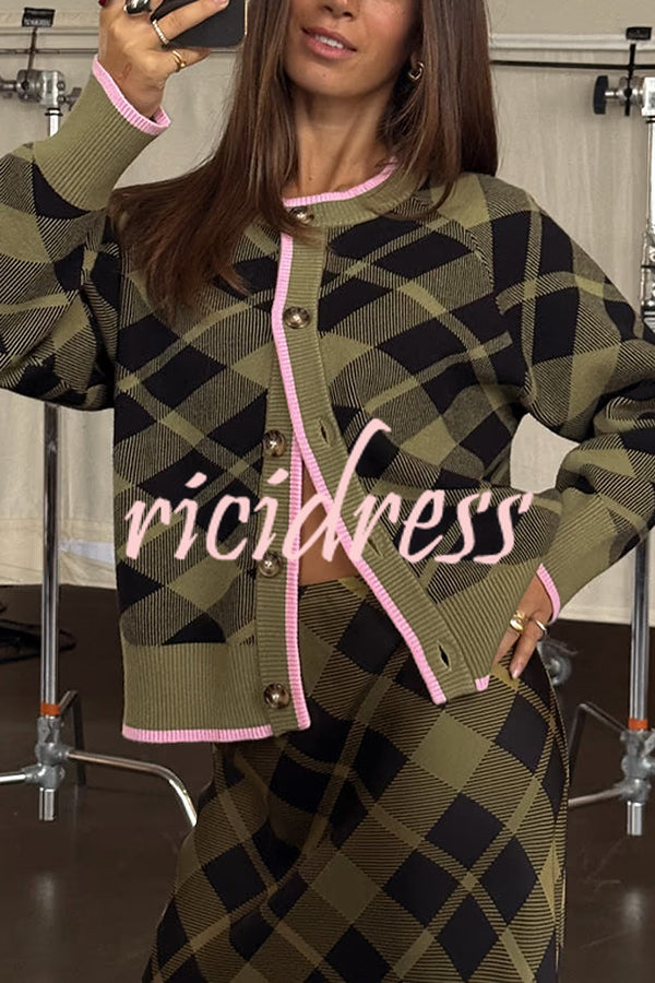 Women's green plaid cardigan with pink trim and buttons