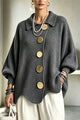 Women's oversized ribbed cardigan with collared neckline, balloon sleeves and large front buttons