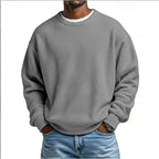 Men's relaxed textured crew neck sweatshirt with long sleeves and ribbed trims