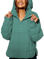 Women's oversized hooded quilted pullover jacket with long sleeves and front pockets