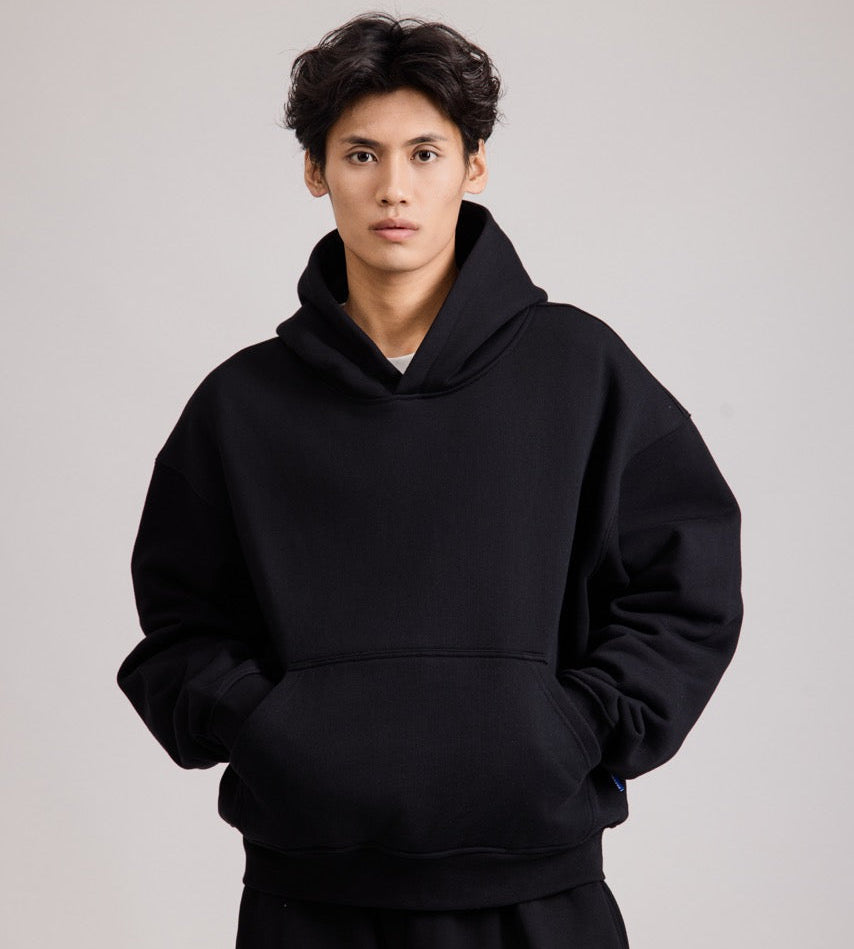 Men's black pullover hoodie with hood and front pouch pocket