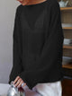 Women's open-knit oversized sweater with wide sleeves and crew neck