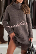 Women's relaxed turtleneck knit sweater with long sleeves and ribbed trims