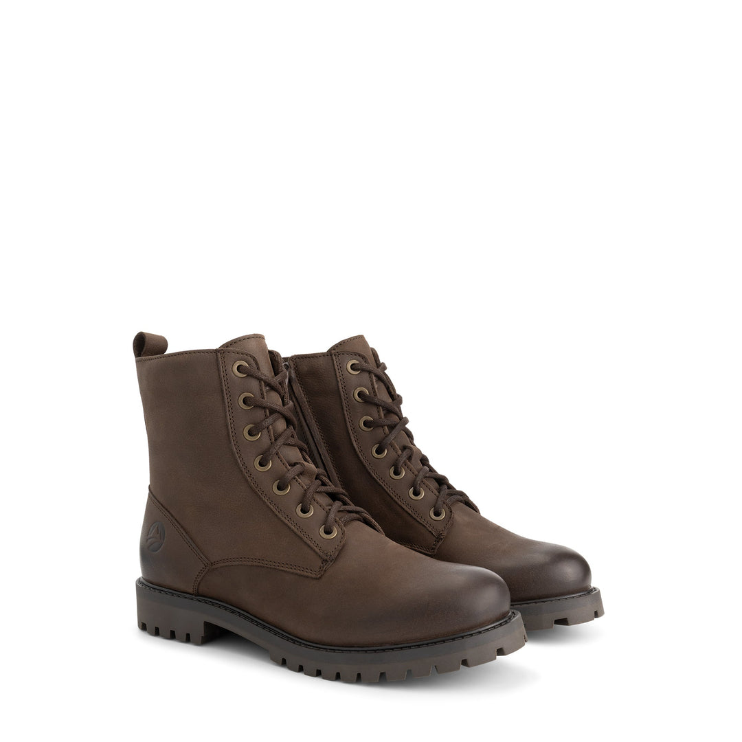 Brown lace-up ankle boots with side zippers and lugged soles
