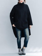 Women's loose turtleneck sweatshirt with long sleeves and a hi-low hem