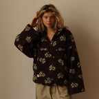 Women's floral fleece hoodie with hood, long sleeves, front zip and pouch pocket