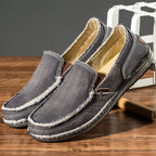 Unisex canvas loafer with moc toe, contrast stitching and flat sole