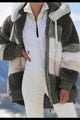 Women's striped hooded zip hoodie with plush textured finish and front pockets