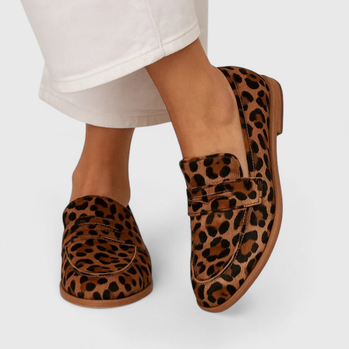 Women's brown leopard print loafers with round toes and low heels