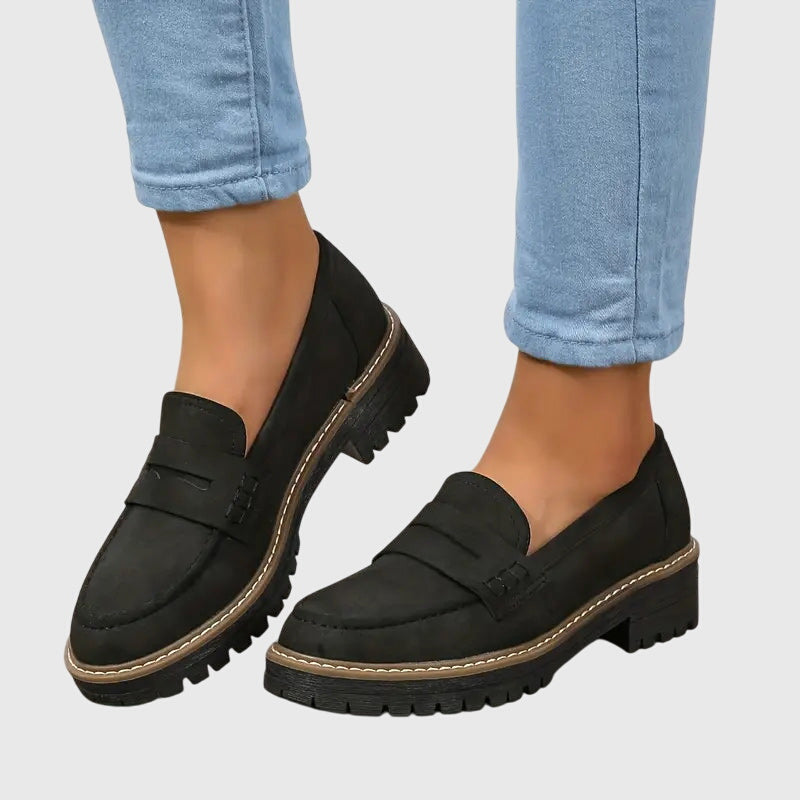 Women's penny loafers with round toes and low lug soles