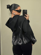Women's hooded sweatshirt with rhinestone flame detailing on the back and sleeves